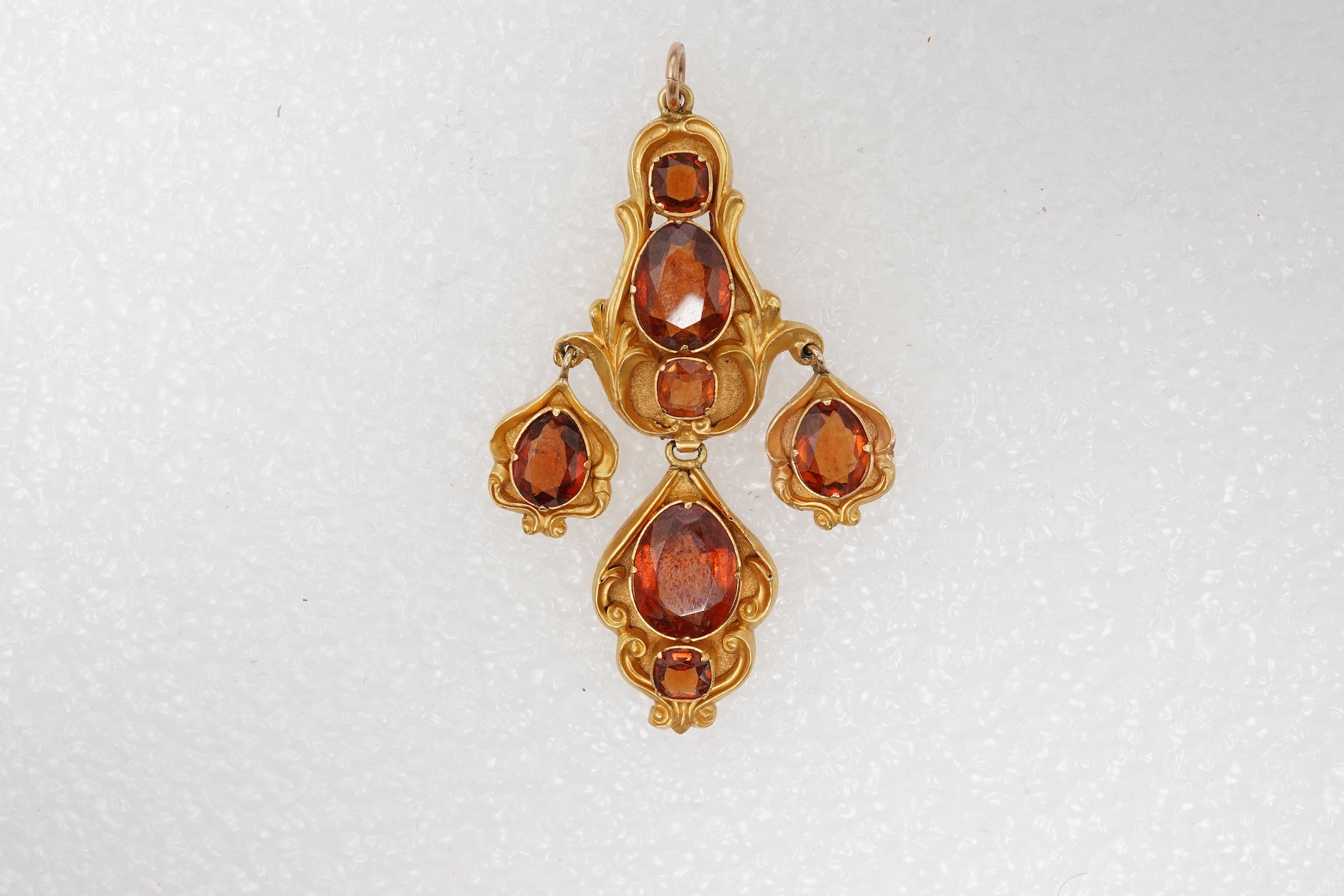 A hessonite garnet pendant, mid 19th century